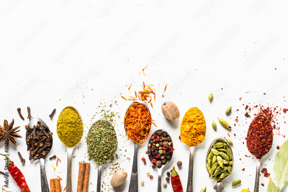 Set of various spices in spoons on white - obrazy, fototapety, plakaty 