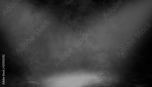 White stage spotlight with smoke on the floor . Misty texture backround. © Victor