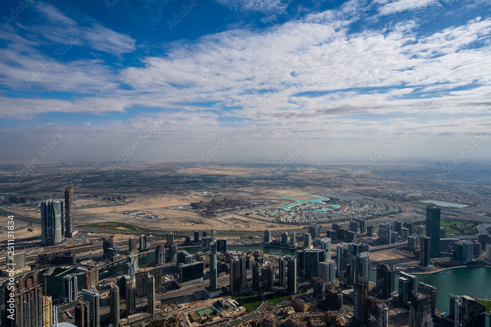 Fototapeta premium Bird view of Dubai skyline at daytime