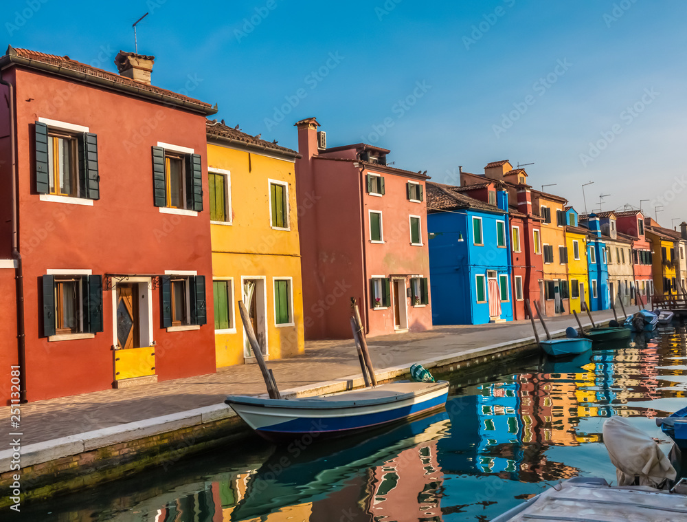 Obraz premium Burano, an island in the Venetian Lagoon, Venice, Veneto, northern Italy. Located at the northern end of the Lagoon, known for its lace work and brightly coloured homes.