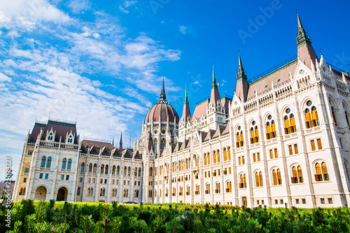 Gothic parliament exterior facade, magnificent blue sky in summer. Budapest, Hungary. 