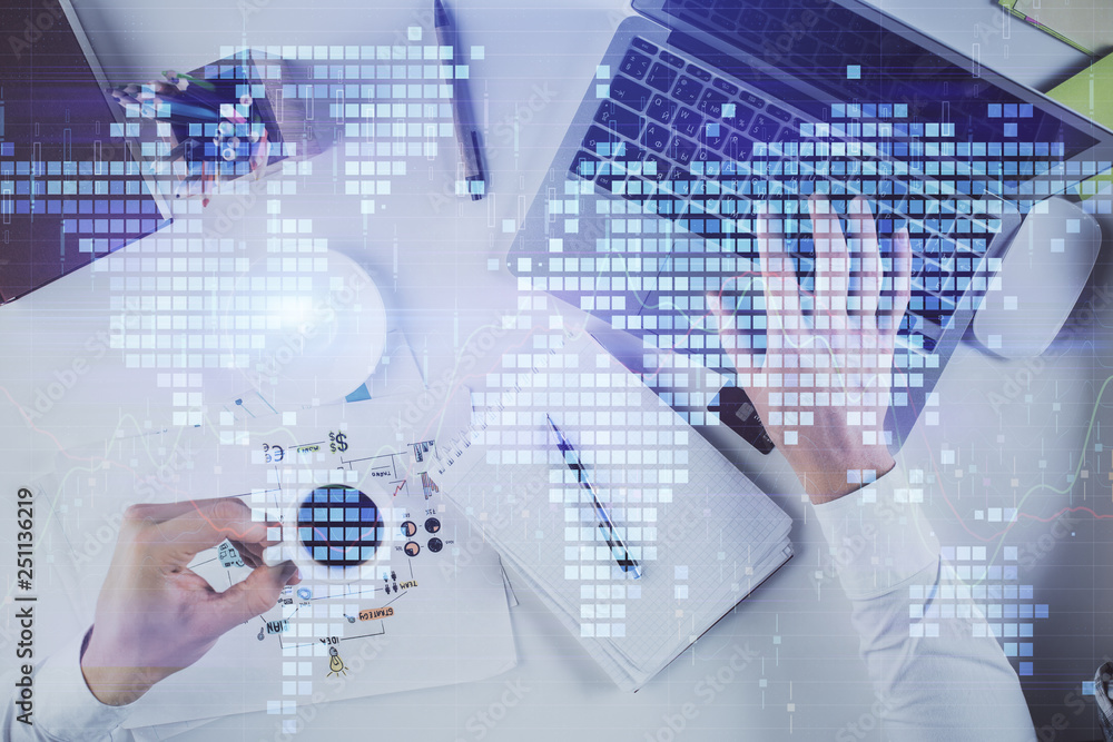 Double exposure of World map polygonal with person typing on laptop. Globalization concept. Double exposure of World map polygonal with person typing on laptop. Globalization concept.