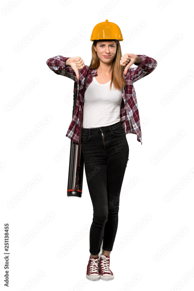 A full-length shot of a Architect woman showing thumb down over isolated white background