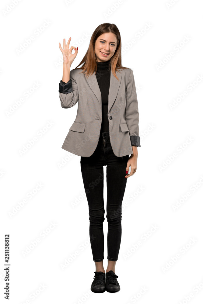 A full-length shot of a Business woman showing ok sign with fingers over isolated white background A full-length shot of a Business woman showing ok sign with fingers over isolated white background