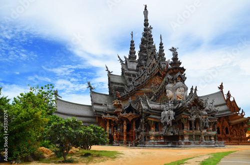 Asian wooden temple with many sculptures