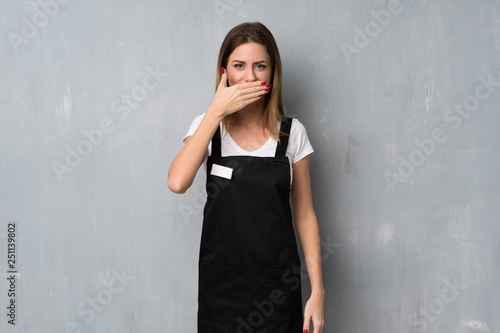 Employee woman covering mouth with hands for saying something inappropriate