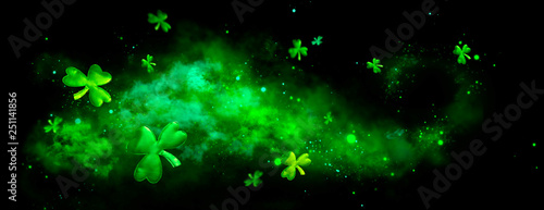 St. Patrick's Day green blurred background with shamrock leaves. Patrick Day. Abstract border art design. Magic clover nature backdrop