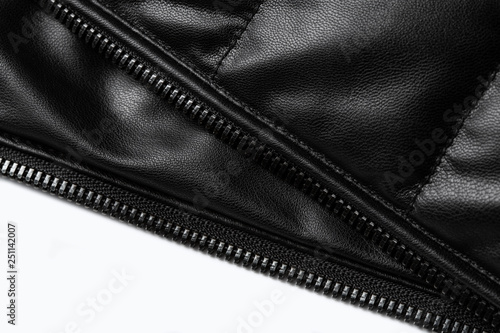 Black leather texture closeup as background. Jacket leather fabric texture.