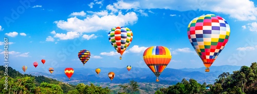 Colorful hot air balloon fly over mountain view 2