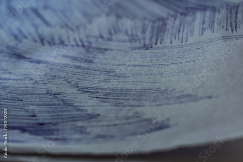 Wallpaper Mural A sheet of white paper with painted dirty strokes, a blue ballpoint pen. Blurred background, shallow depth of field. Drawn record. Incomprehensible scribbles. The texture of an ordinary sheet of torn  Torontodigital.ca