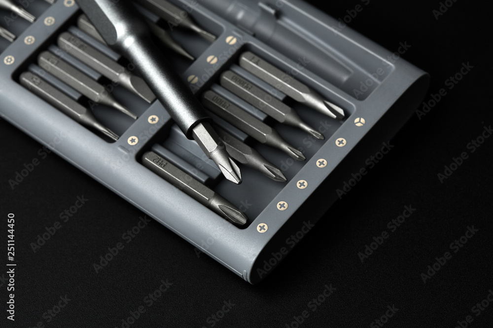 Set of bits for screwdriver. Metal bits for screwdriver. Tool set for household use. Nozzles and adapters for screwdrivers. Head different size hex driver. Set of bits for screwdriver. Metal bits for screwdriver. Tool set for household use. Nozzles and adapters for screwdrivers. Head different size hex driver.