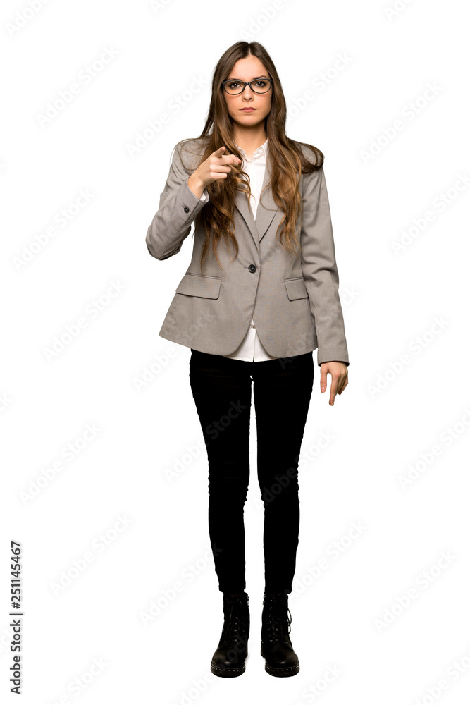 Full-length shot of Business woman frustrated by a bad situation and pointing to the front on isolated white background Full-length shot of Business woman frustrated by a bad situation and pointing to the front on isolated white background