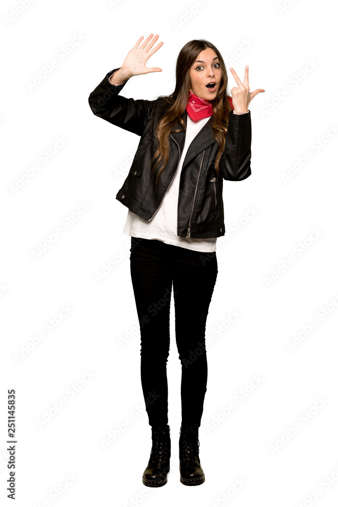 Full-length shot of Young woman with leather jacket counting eight with fingers on isolated white background Full-length shot of Young woman with leather jacket counting eight with fingers on isolated white background
