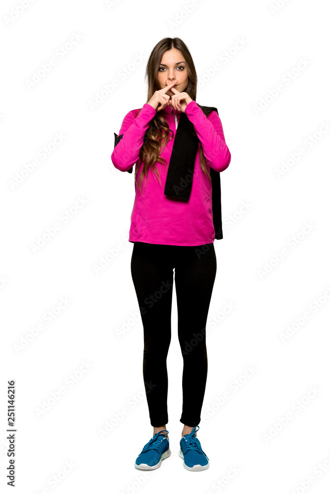 Full-length shot of Young sport woman showing a sign of silence gesture over isolated white background Full-length shot of Young sport woman showing a sign of silence gesture over isolated white background