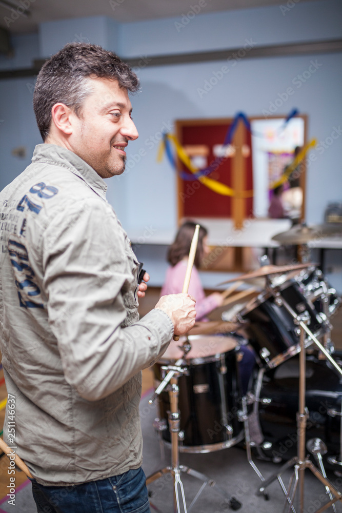 Drum class in a music school Drum class in a music school