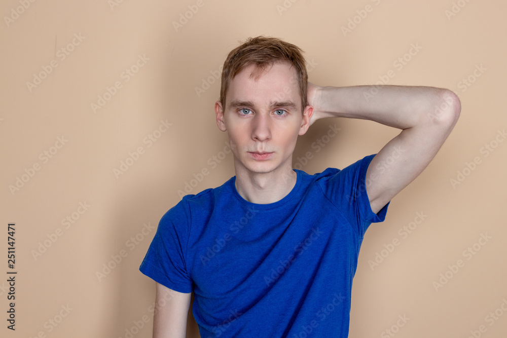Young serious man posing and looking at camera Young serious man posing and looking at camera
