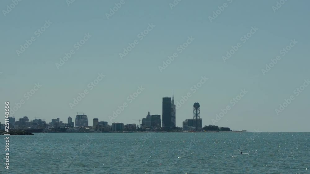 A view of the city with skyscrapers and the sea. Day, sunny. Batumi, Georgia A view of the city with skyscrapers and the sea. Day, sunny. Batumi, Georgia