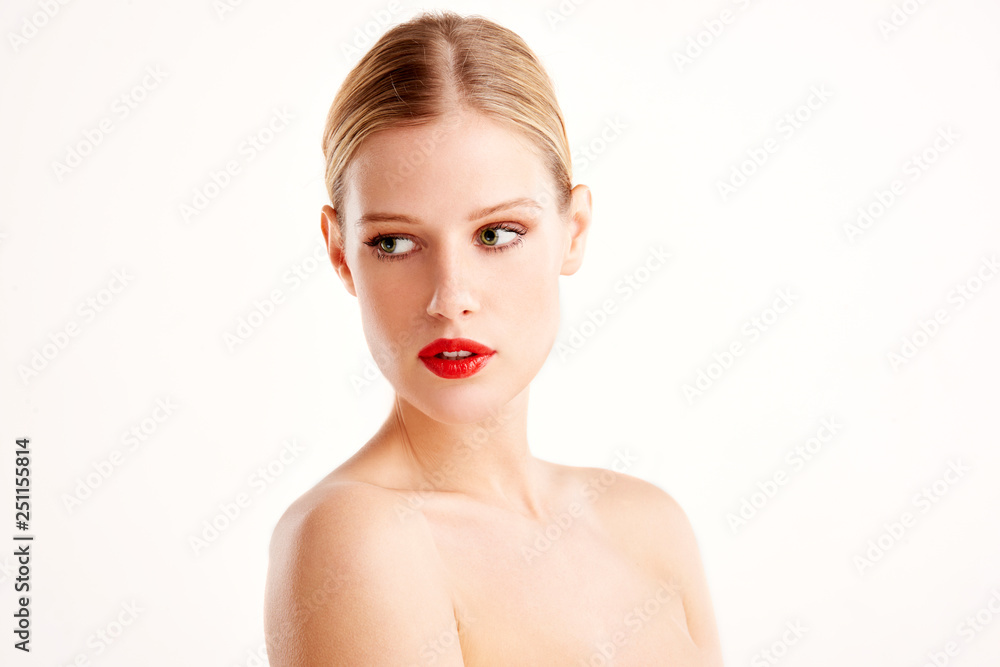 Portrait of attracive young woman face while standing at isolated white background Portrait of attracive young woman face while standing at isolated white background