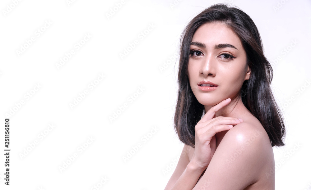 Smiling young woman isolated on white background. Asian happy girl looking at camera. Skin care face healthy young women in studio white. Smiling young woman isolated on white background. Asian happy girl looking at camera. Skin care face healthy young women in studio white.