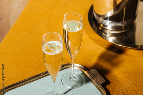 Valdobbiadene Cartizze Prosecco flutes and a bottle, in pop contemporary style. Prosecco is an italian sparkling wine cultivated and produced in Valdobbiadene-Conegliano area