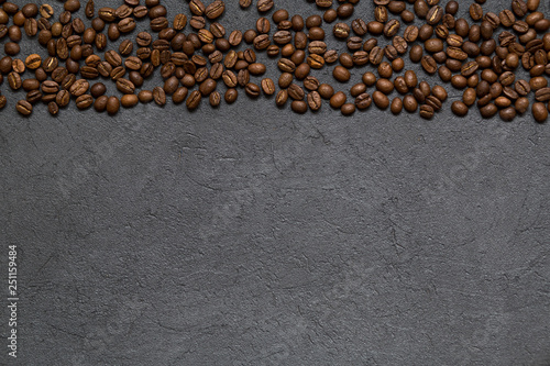 Coffee beans on a black background. Top view,copy space.