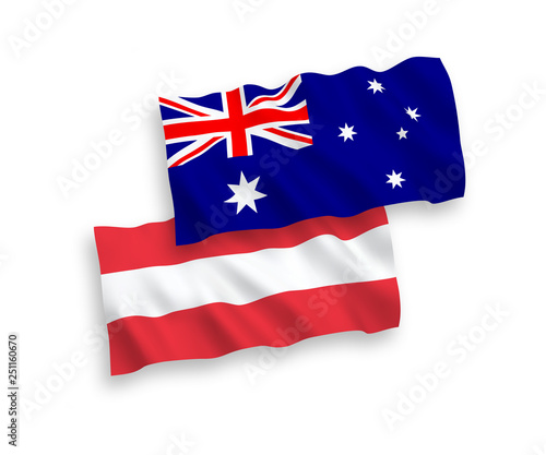 National vector fabric wave flags of Australia and Austria isolated on white background. 1 to 2 proportion.