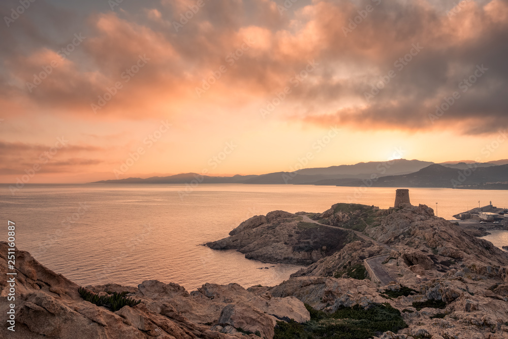 Sunrise over Genoese tower at Ile Rousse in Corsica