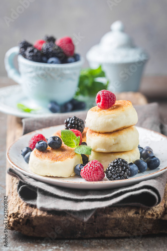 Cottage cheese pancakes with berries. Healthy Breakfast.
