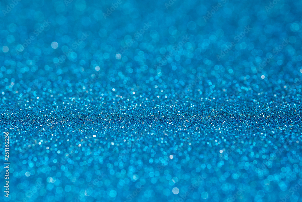 Abstract blue sparkling glitter wall and floor perspective background studio with blur bokeh.luxury holiday backdrop mock up for display of product.holiday festive greeting card.