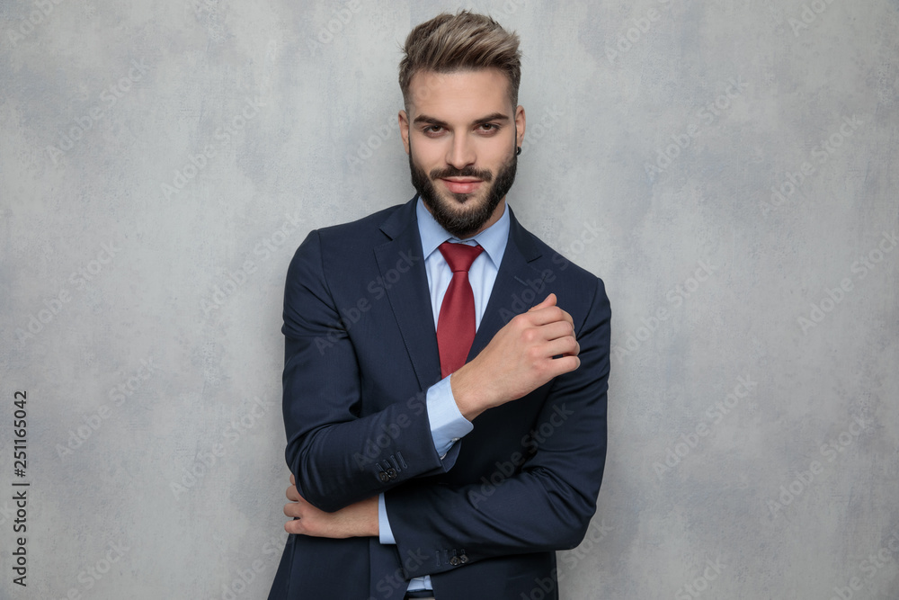 smiling young businessman is thinking smiling young businessman is thinking