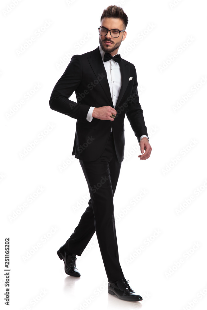 elegant man walking from side to side elegant man walking from side to side
