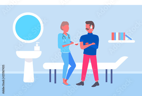 female doctor giving injection vaccine shot to male patient vaccination concept modern hospital room interior full length flat horizontal