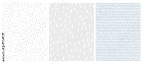 Set of 3 Cute Abstract Geometric Vector Patterns. White, Gray and Blue Color Design. Brushed Raindrops on a White and Light Grey. Irregular White Waves on a Light Blue Background. 