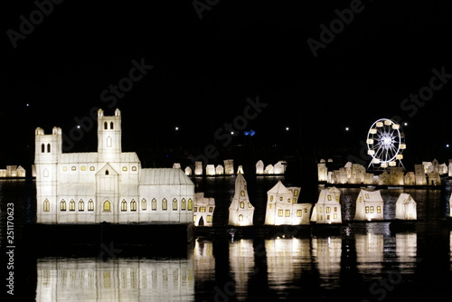 Floating city night at Sefton Park in Liverpool, illuminated plastic replicas of real Liverpool buildings floating on the lake photo