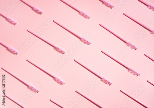 Tela Creative concept beauty photo of lashes extensions brush on pink background