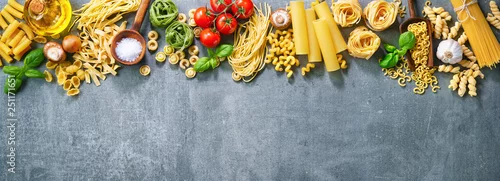 Obraz  z motywem Various pasta over stone background