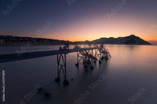 Canvas Print Sunset at La Concha (Kontxa) bay at Donostia-San Sebastian, Basque Country