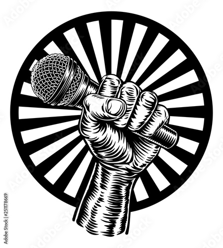 A fist hand holding a micro...