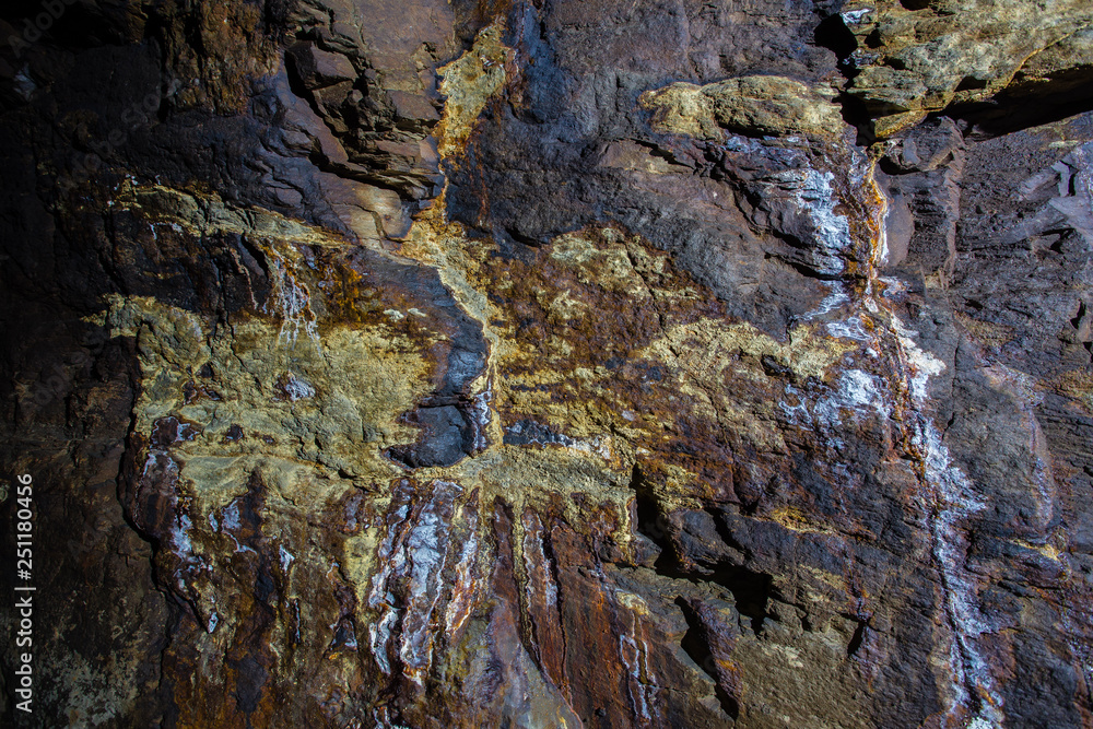 Fototapeta premium Underground gold ore mine shaft tunnel gallery with sulfur specimen
