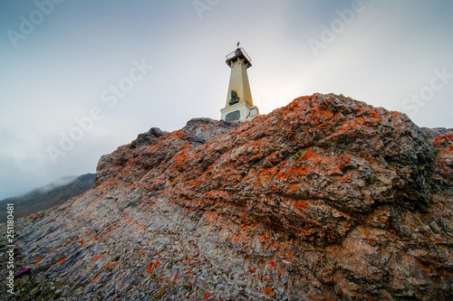 Lighthouse-monument to Semen Dezhnev on the coast of the Bering Strait. The environs of Cape Dezhnev (the easternmost point of Eurasia). Chukotka, Far East of Russia. © Andrei Stepanov
