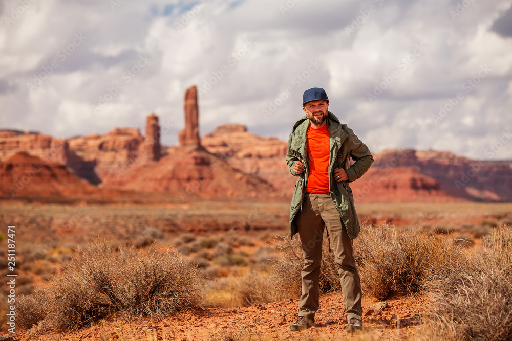 Hiker in Valley of Gods, USA Hiker in Valley of Gods, USA