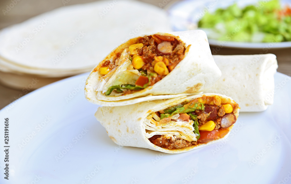 Chili Con Carne Burrito with fresh vegetable. Chili Con Carne Burrito with fresh vegetable.