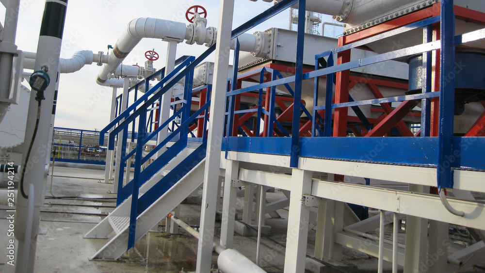 Heat exchangers at oil refinery. Heat exchangers at oil refinery.