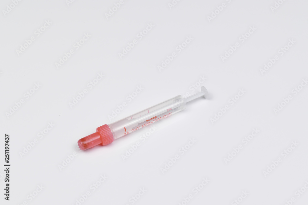 Single use syringe isolated on white Single use syringe isolated on white