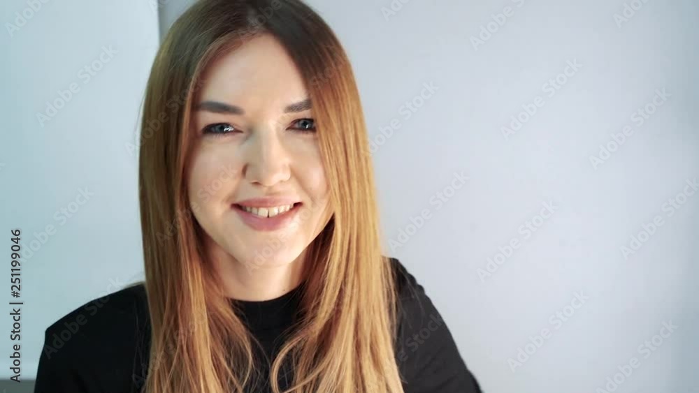 Portrait of a young makeup artist woman with brushes in her hands in a beauty Studio. Portrait of a young makeup artist woman with brushes in her hands in a beauty Studio.