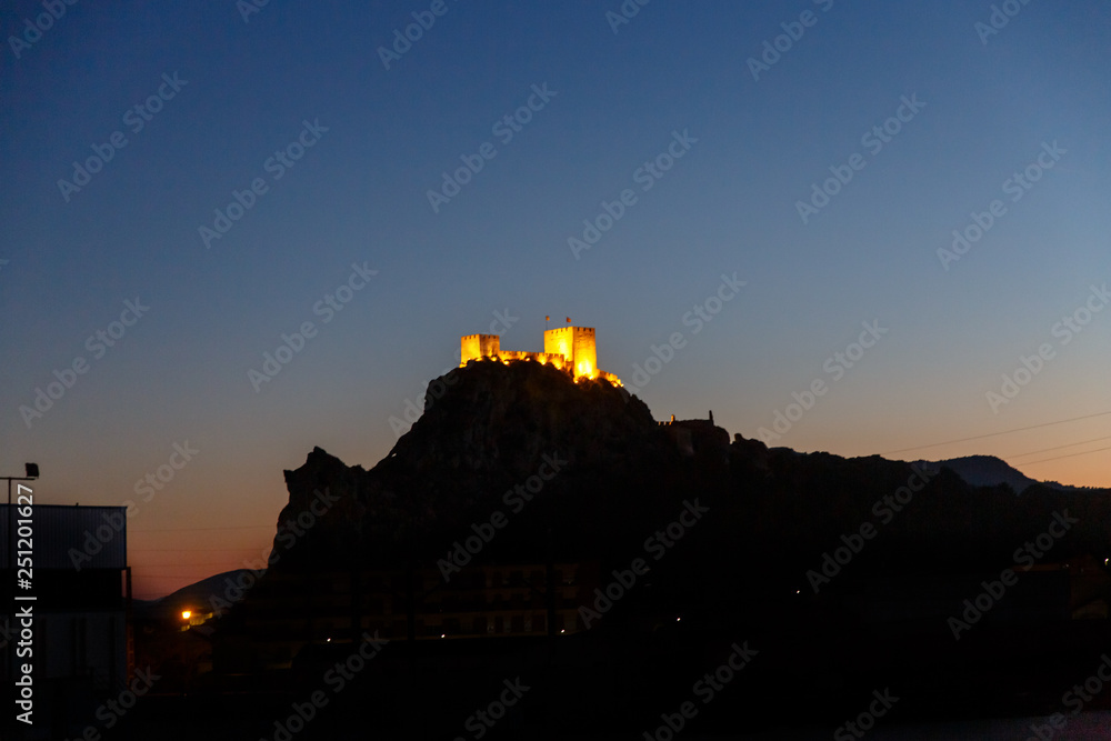 Spain, the old castle of SAX in the night on the mountain.