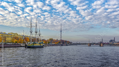 Sailboat, floating bar, moored on Petrogradskaya embankment in St. Petersburg.