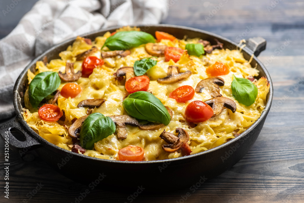 casserole  pasta with mushrooms, sausage and cheese