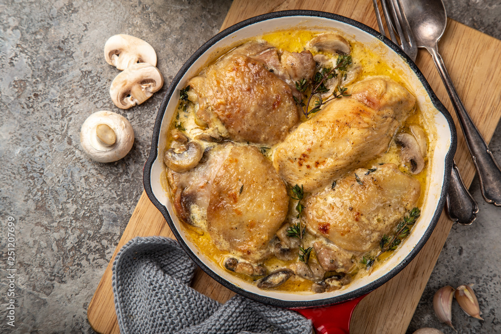 roasted  chicken with mushroom in cream garlic sause  on pan