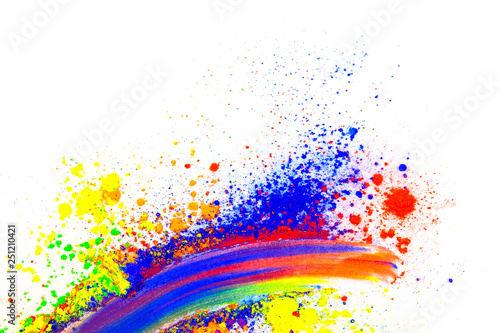 Obraz na płótnie Multi-colored natural pigment powder smeared on a sheet of white paper